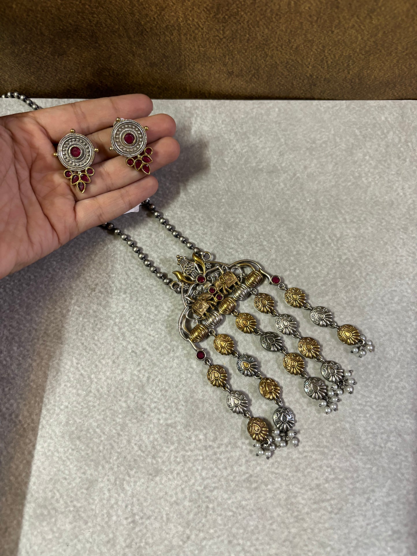 Krishna Motif Dual-Tone Temple Necklace with Mother of Pearl Accents & Earrings