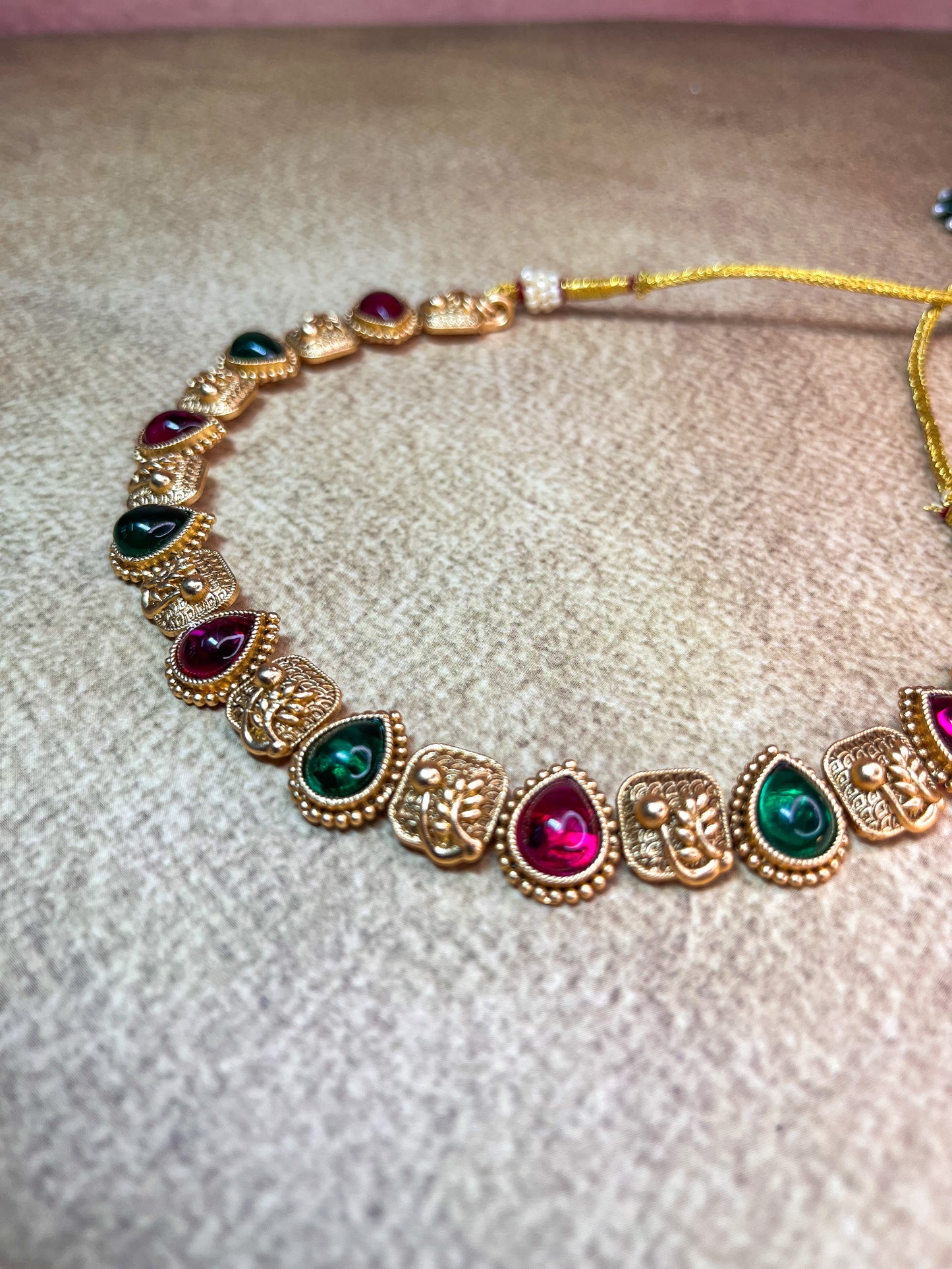 Red and Green stone gold set