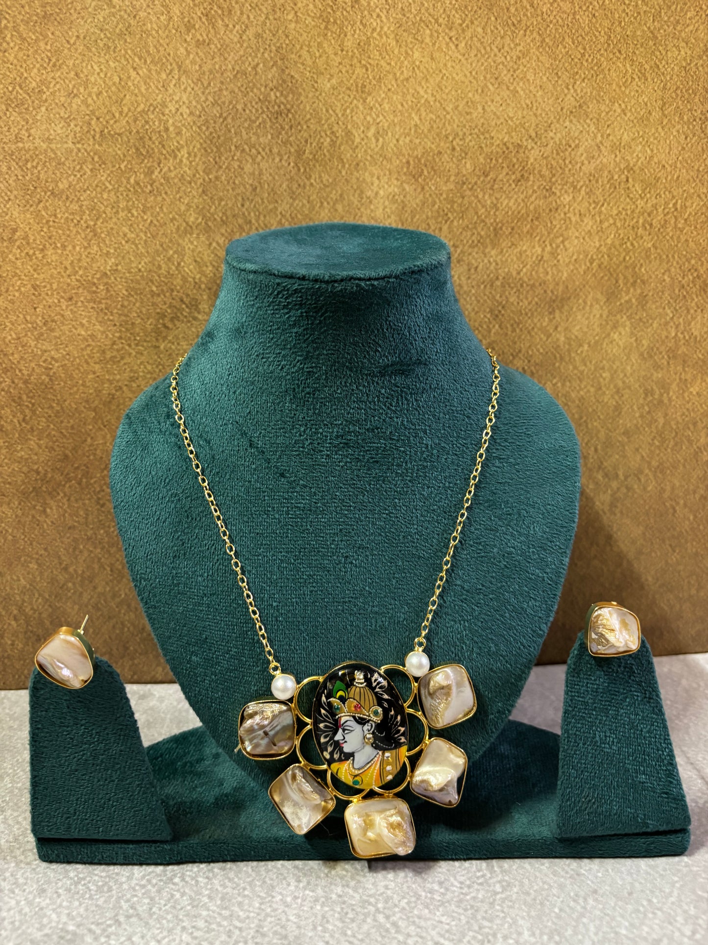 Gold-Tone Krishna Motif Necklace with Mother of Pearl Stones & uncut stone studs