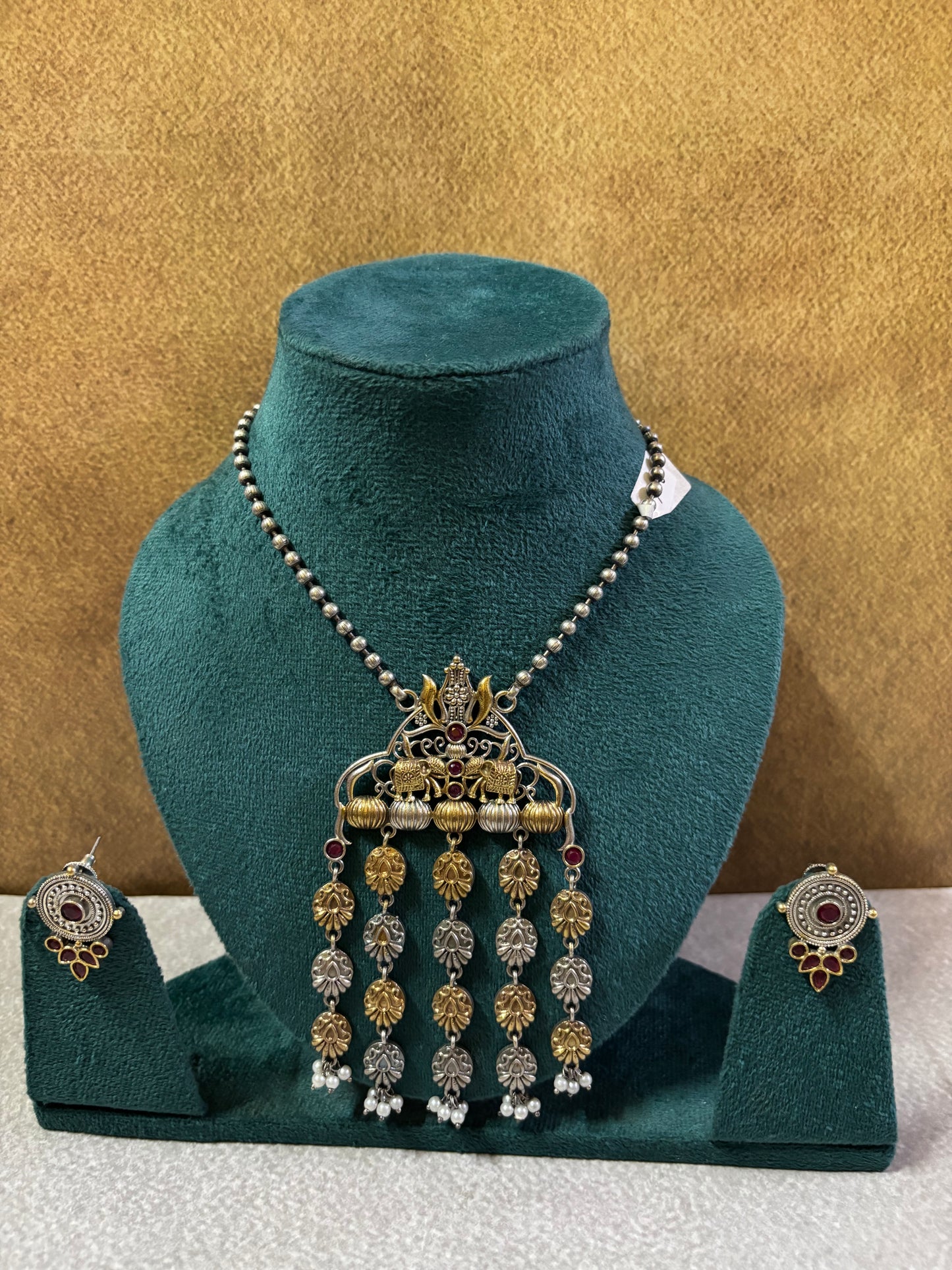 Krishna Motif Dual-Tone Temple Necklace with Mother of Pearl Accents & Earrings