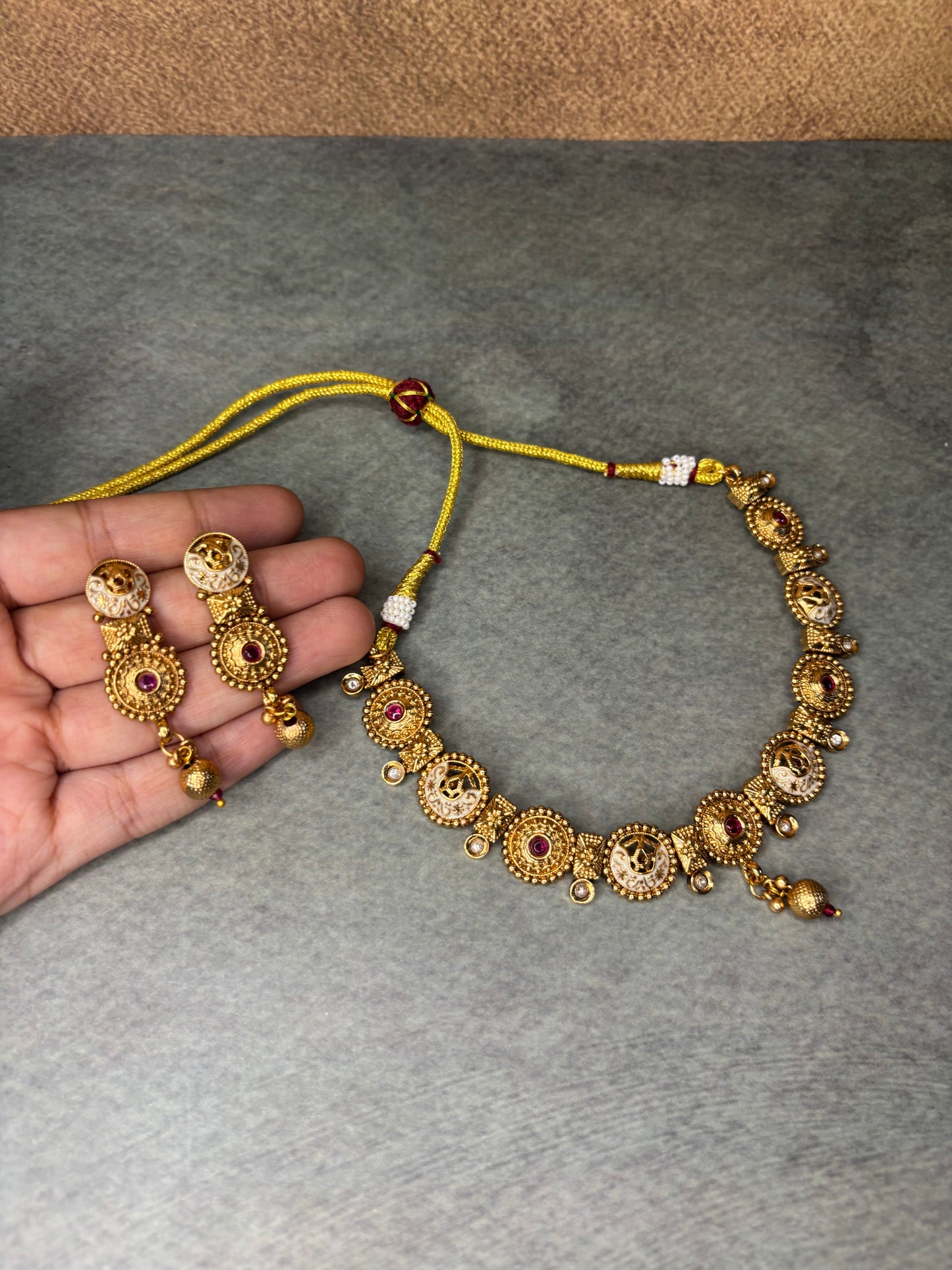 Temple-Inspired Antique Gold Necklace with Ruby Accents