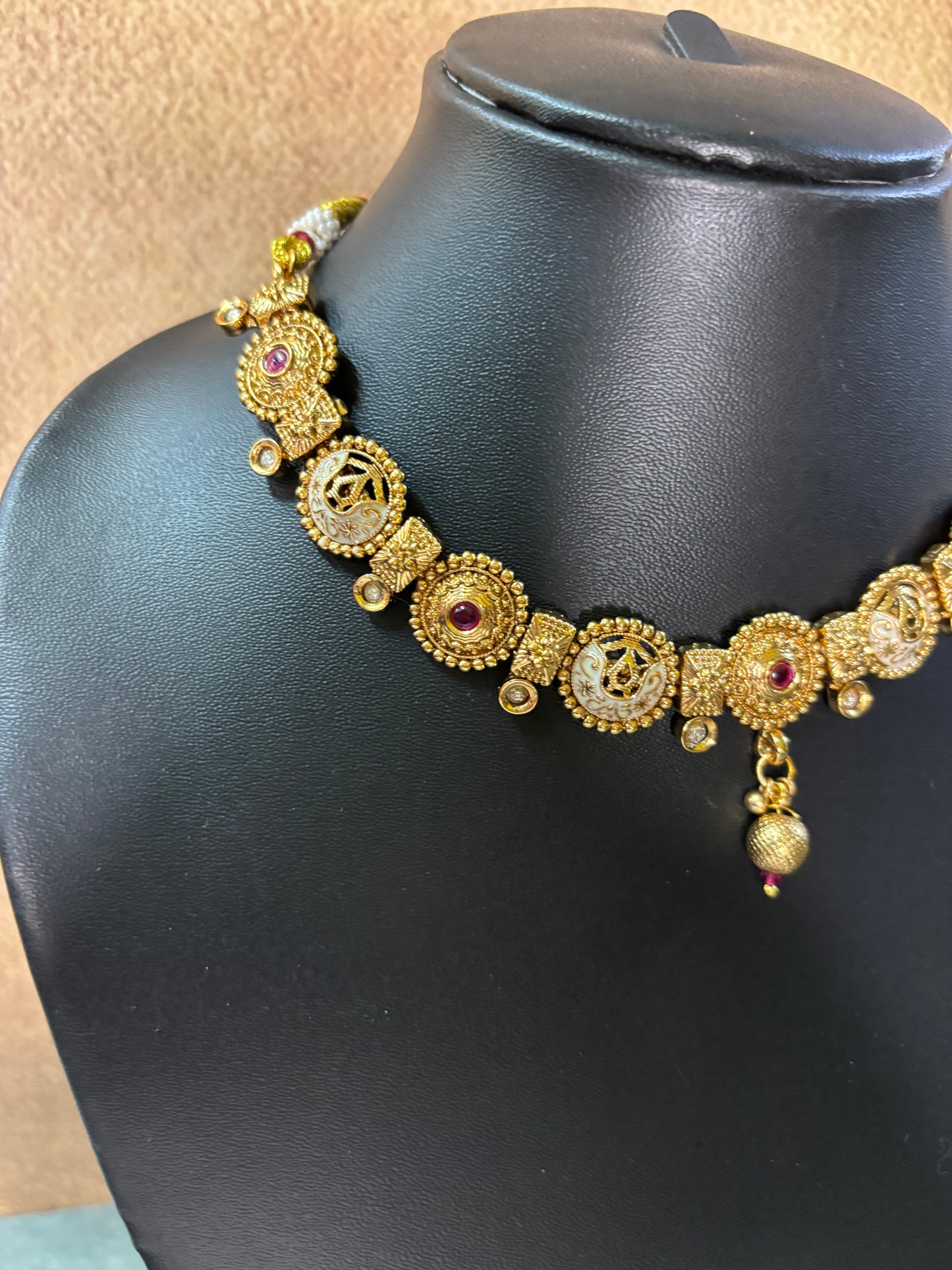 Temple-Inspired Antique Gold Necklace with Ruby Accents