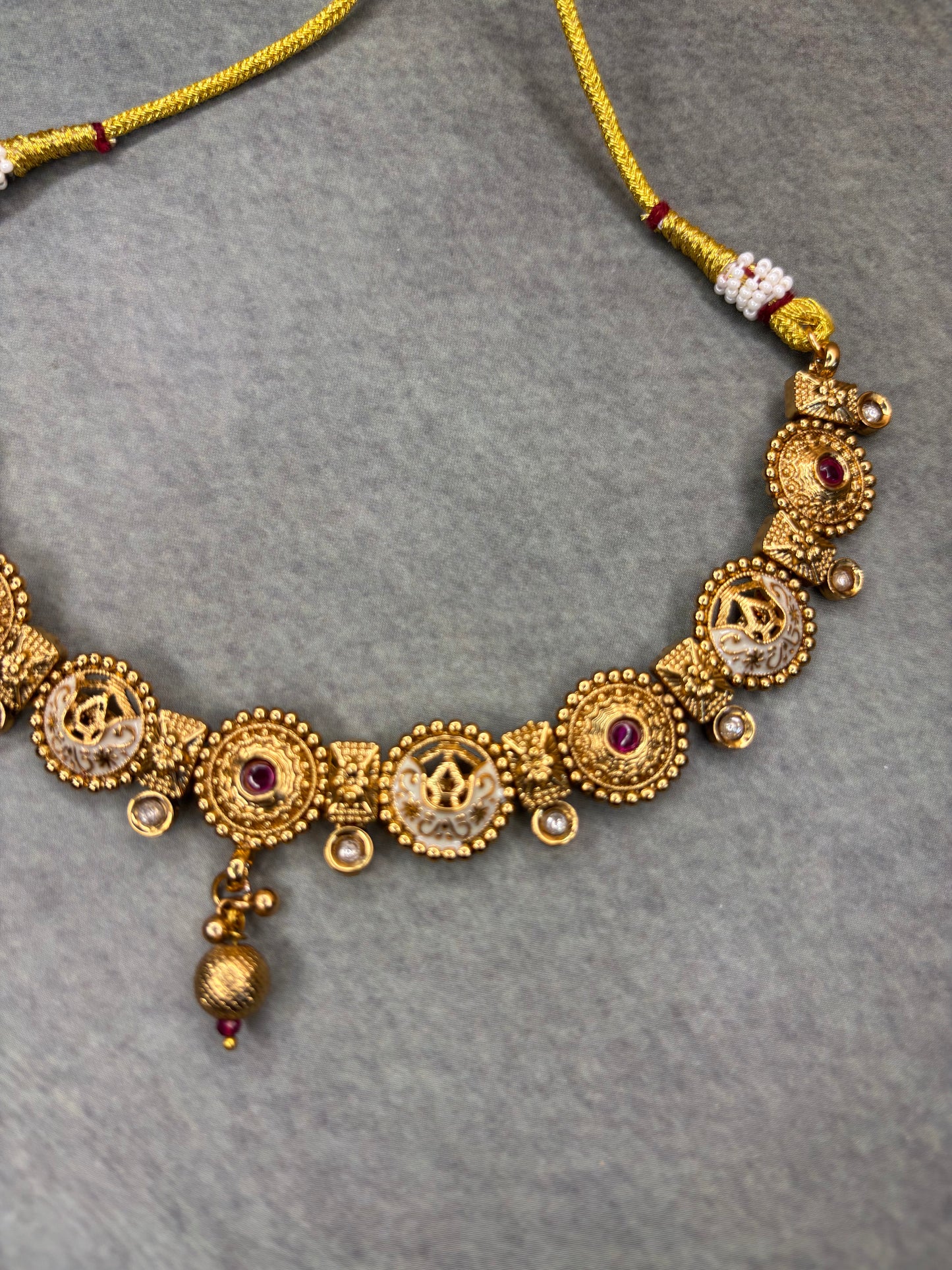 Temple-Inspired Antique Gold Necklace with Ruby Accents