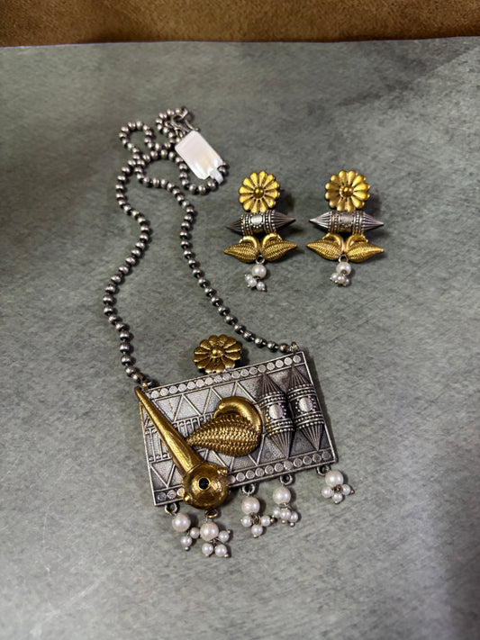 Handcrafted Tribal Pendant with Golden Bird Motif Pearl Drops