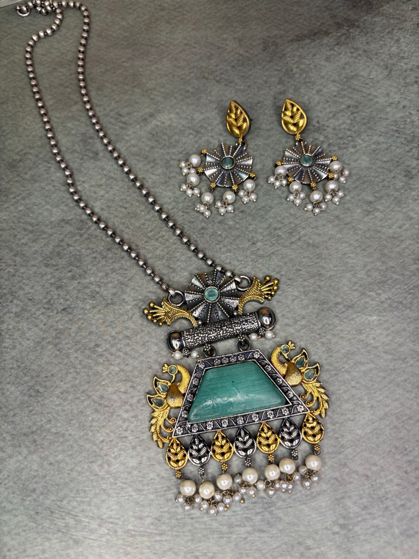 Silver Replica Necklace with Green Pendant – Dual Tone Peacock Motif with Moti Piroi