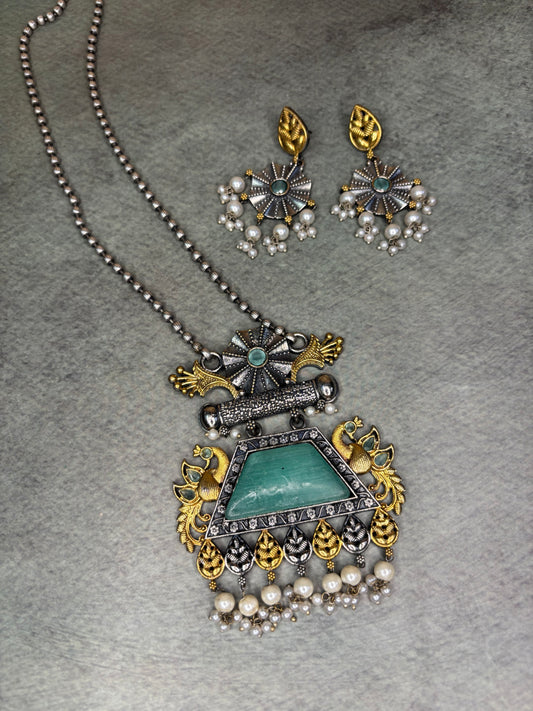Silver Replica Necklace with Green Pendant – Dual Tone Peacock Motif with Moti Piroi