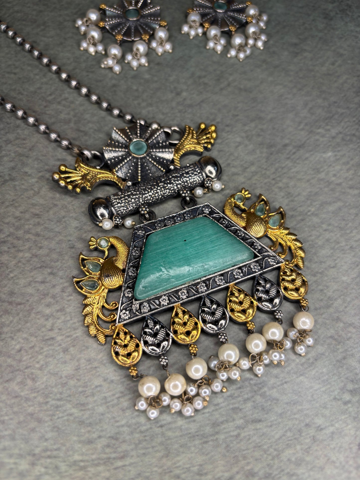 Silver Replica Necklace with Green Pendant – Dual Tone Peacock Motif with Moti Piroi